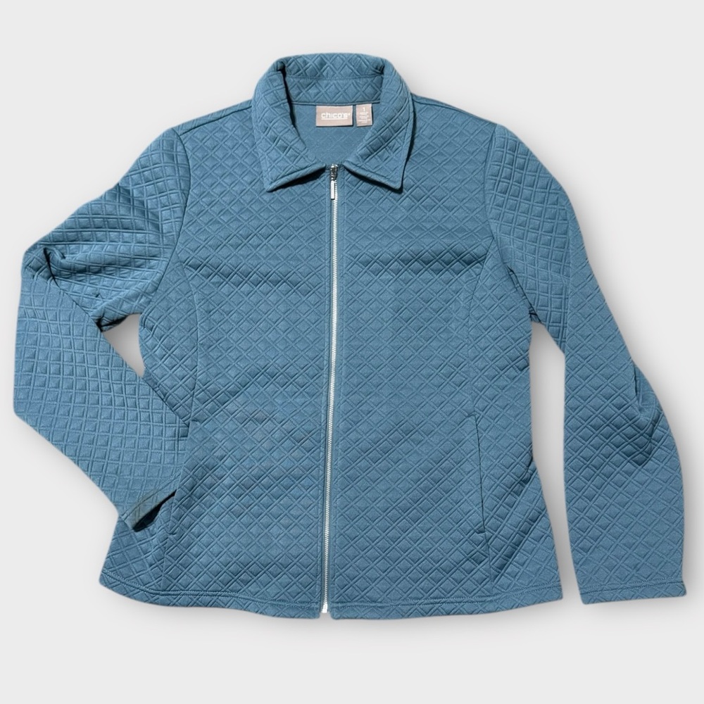 Chicos women’s size one quilted teal colored front zipper jacket.